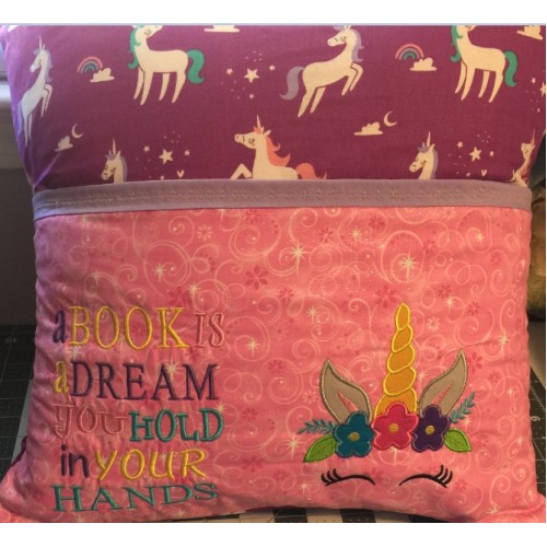 Unicorn Face a book is a dream Reading Pillow