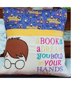 Harry with a book is a dream reading pillow embroidery designs