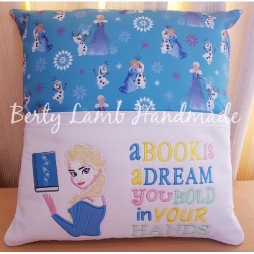 Elsa Frozen book wth a book is a dream reading pillow