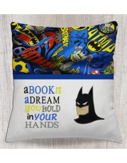 Batman face with a book is a dream reading pillow embroidery designs