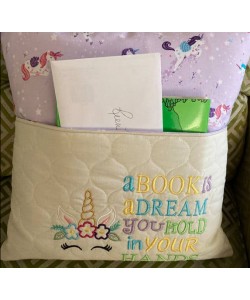 Unicorn empty with a book is a dream Designs