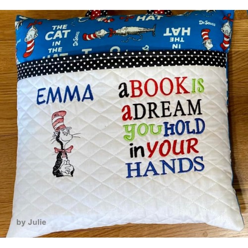 The cat in the hat with a book is a dream Reading Pillow
