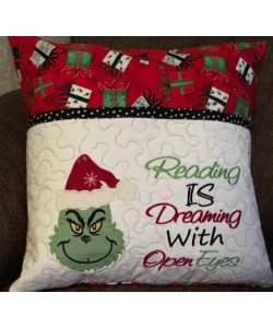 Grinch face with reading is dreaming designs